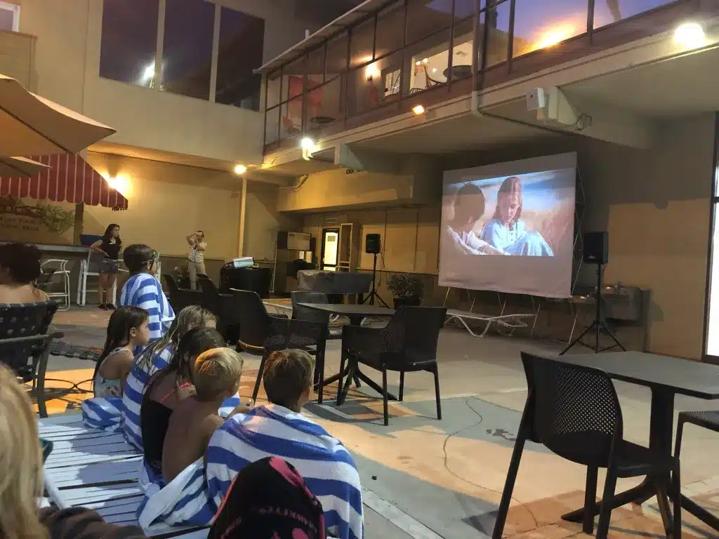 A poolside movie at the San Clemente Inn California