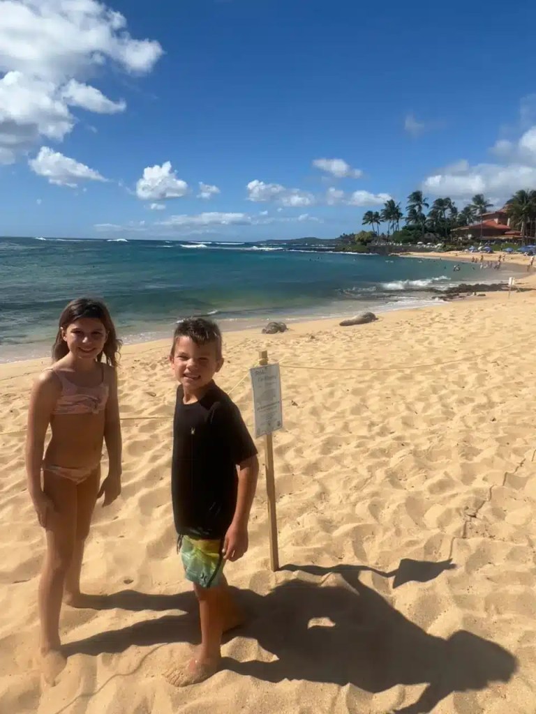 Poipu Beach in Kauai. A great beach for kids in Kauai.