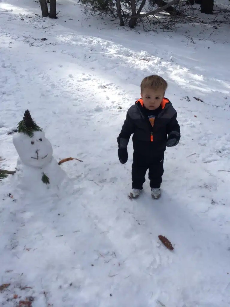 Taking a break from skiing at June Lake to build a snowman