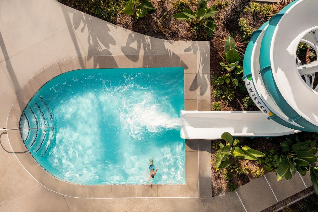 The fun waterslide at The Town & Country makes this one of the hotels with best pools in San Diego.