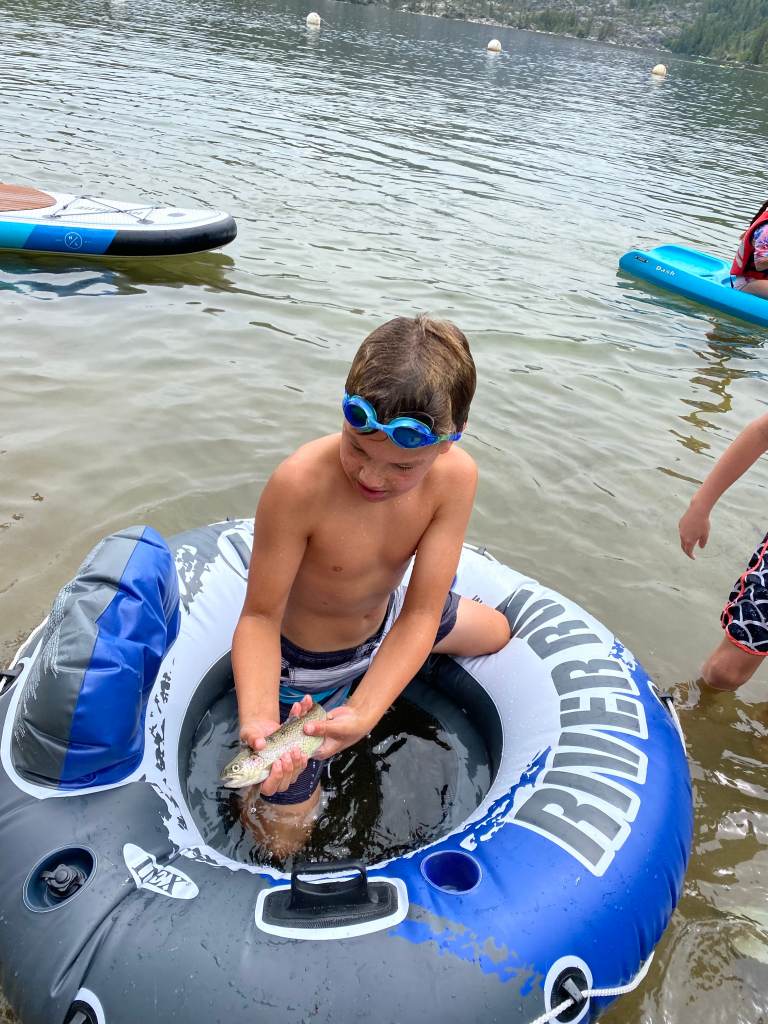 Catching a fish at Pinecrest Lake campground