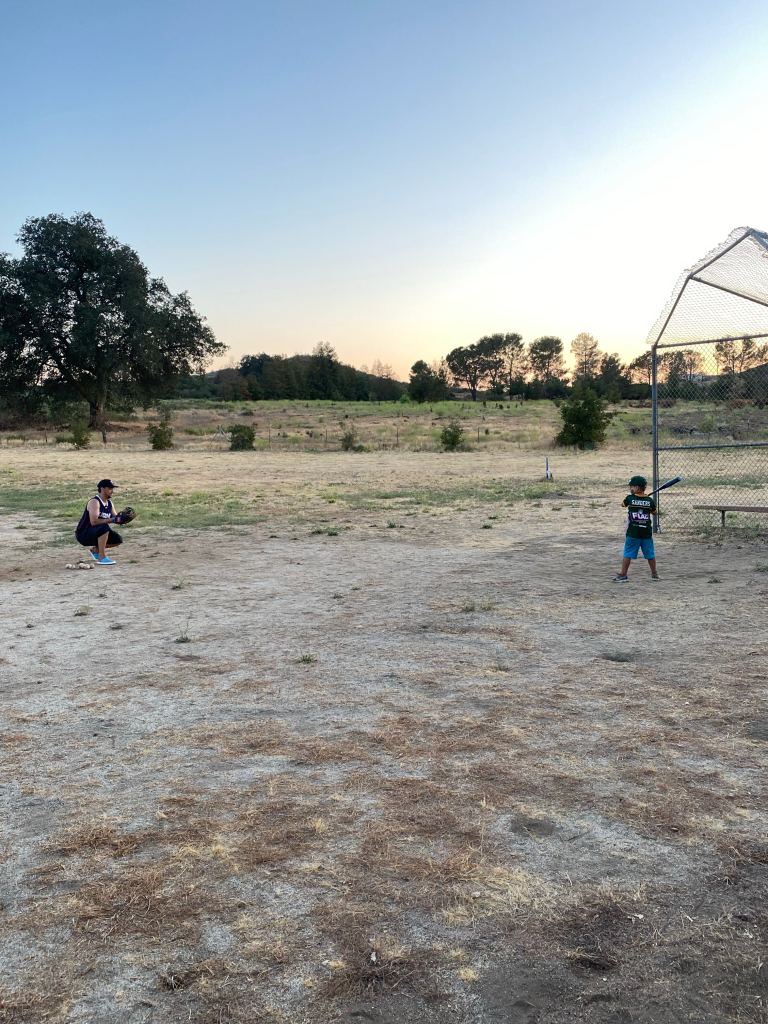 Playing a game of baseball at Potrero County Park