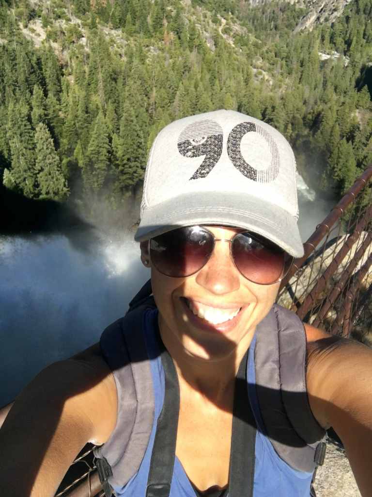 Posing with one of the beautiful waterfalls on the Panorama Trail in Yosemite