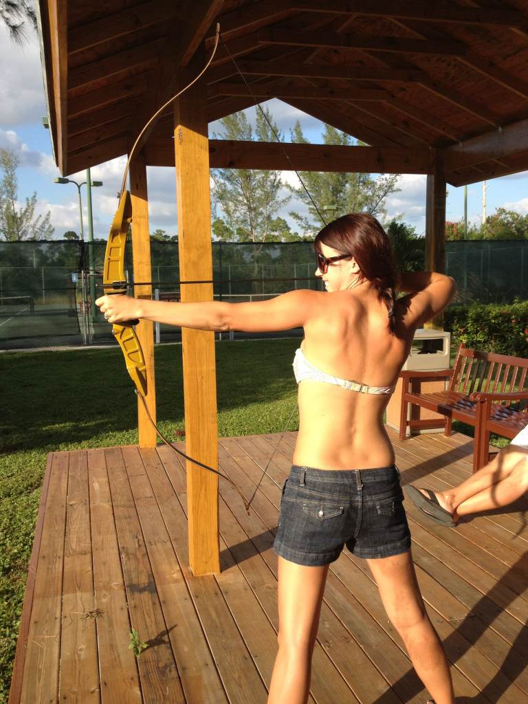 Doing archery at the Bahamas Wyndham Fortuna Beach