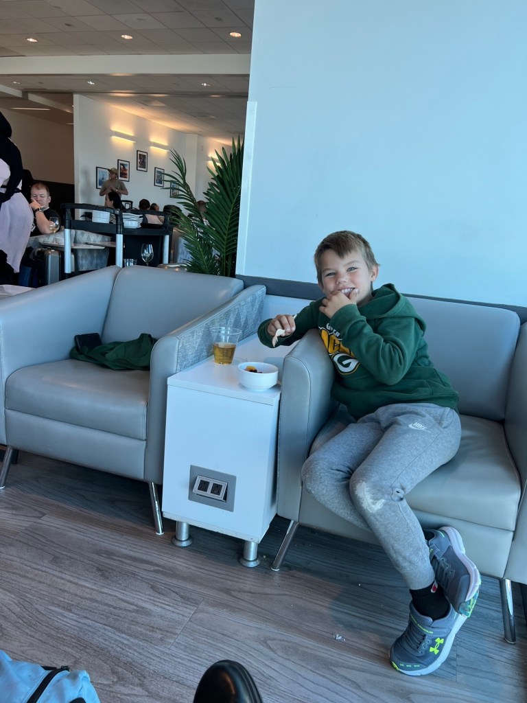 Enjoying breakfast that we got with our Visa lounge access credit card