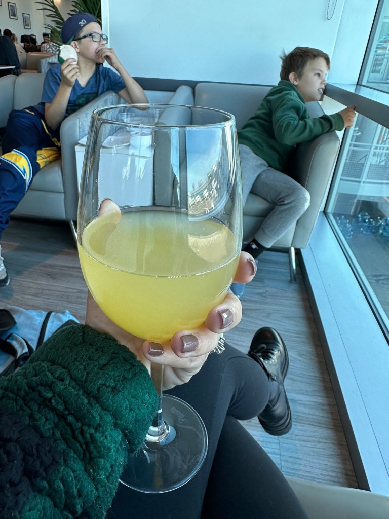 Enjoying my free mimosa thanks to our Visa lounge access credit card