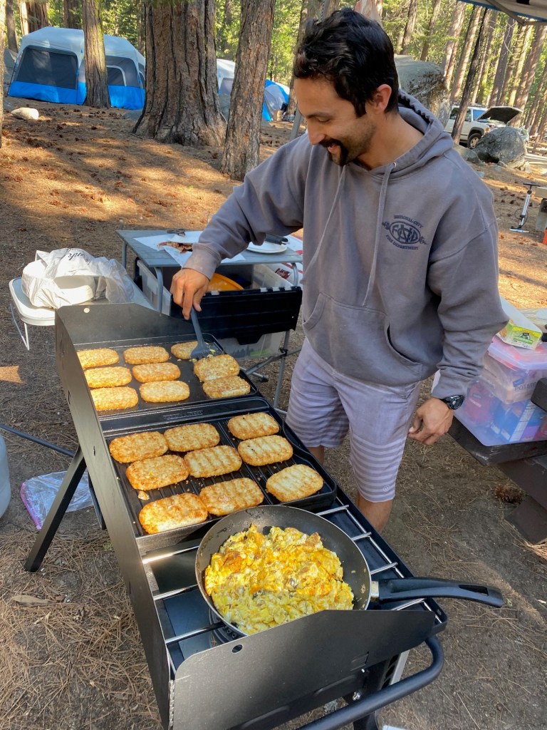 Scrambled eggs and hash brown potatoes make for easy camping meals