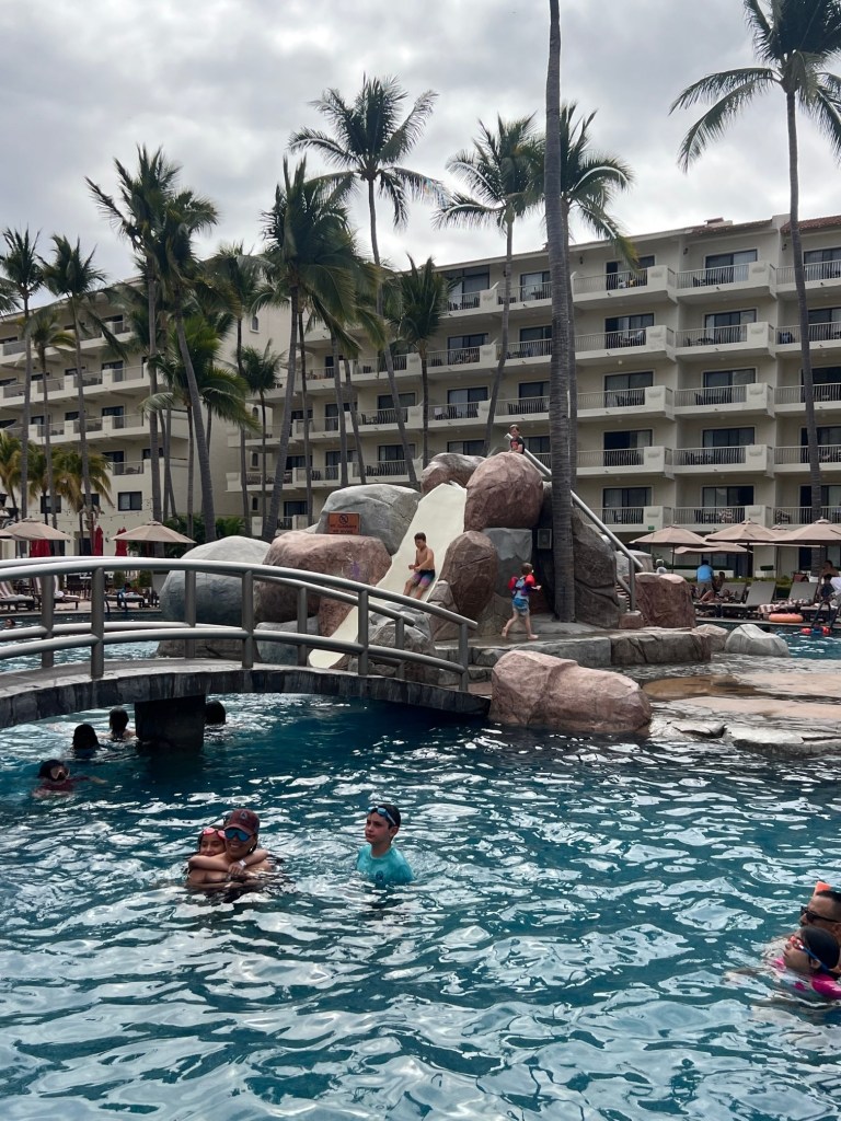 Enjoying the waterslide at the Hotel Villa del Palmar Puerto Vallarta