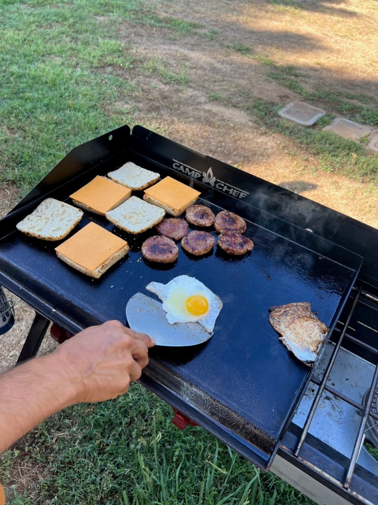 Making breakfast sandwiches for easy camping meals