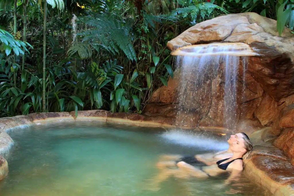 Soaking in the hot springs at the springs hotel in costa rica