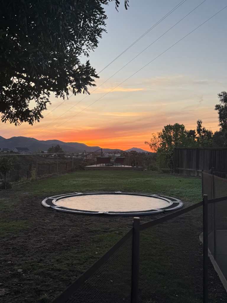 Our in ground trampoline and a beautiful sunset