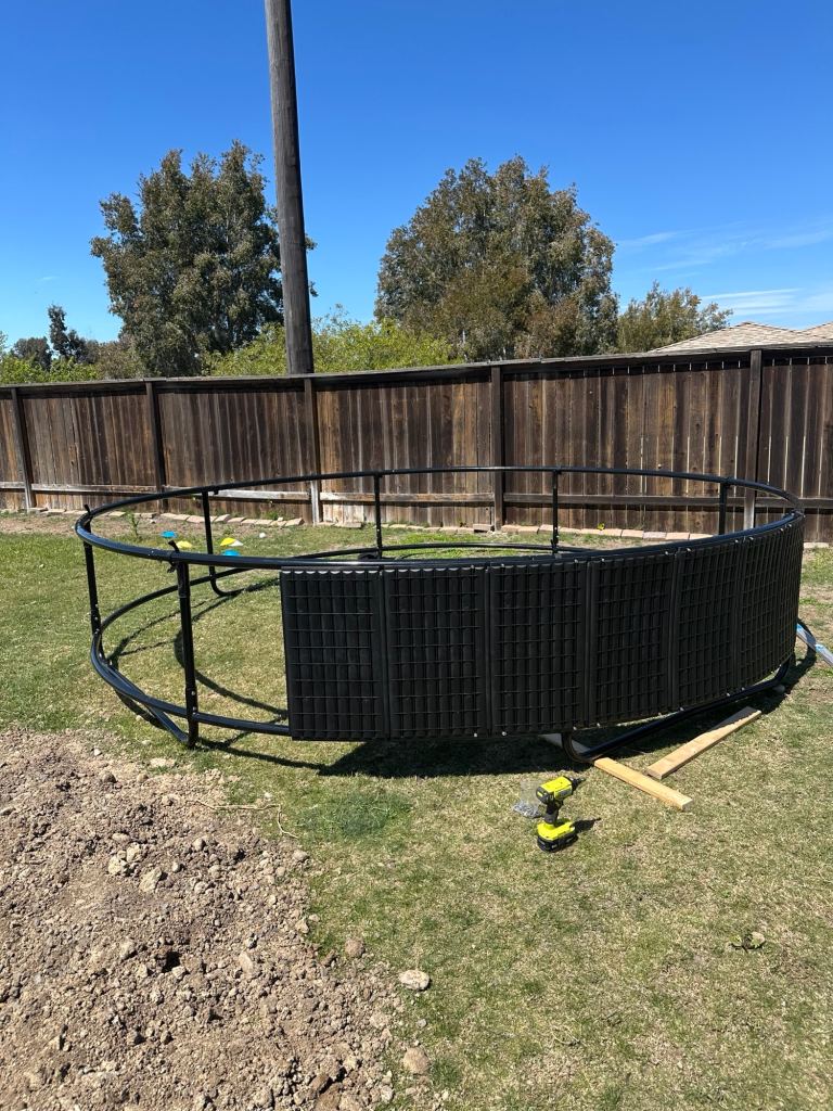 The retaining wall on our inground trampoline kit