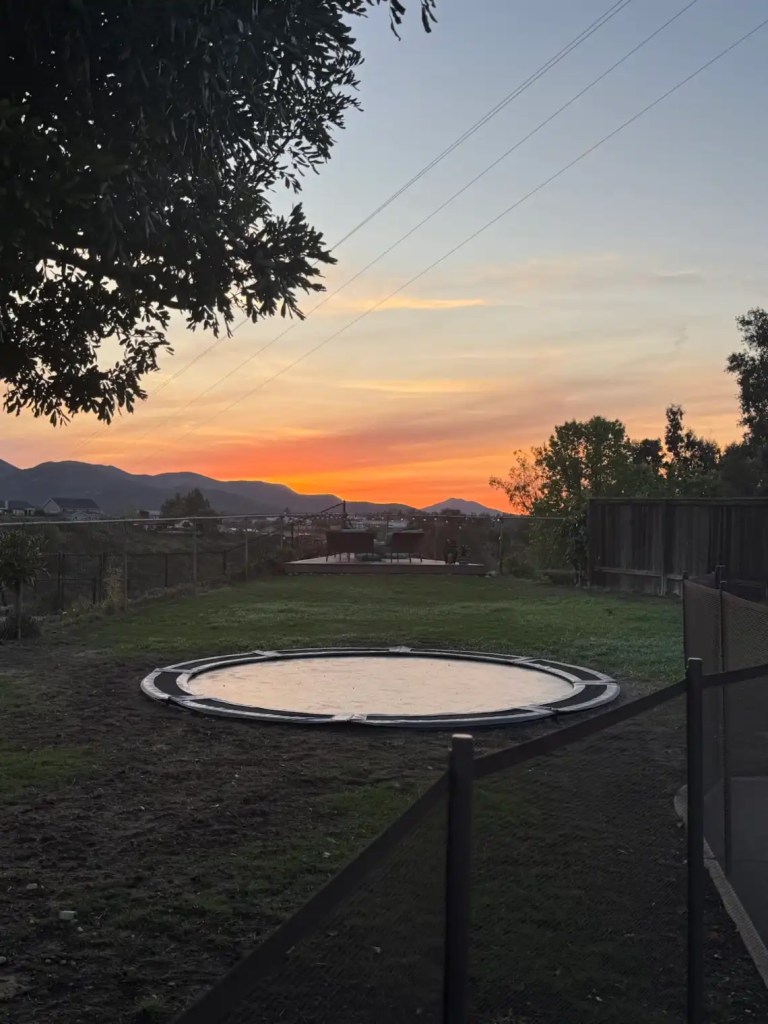Our in ground trampoline and a beautiful sunset