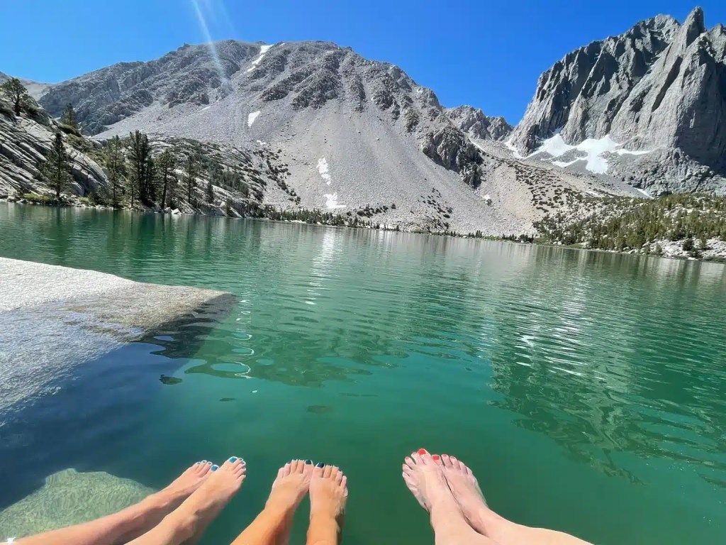 Soaking our feet in the second lake on the Big Pine Lakes Trail