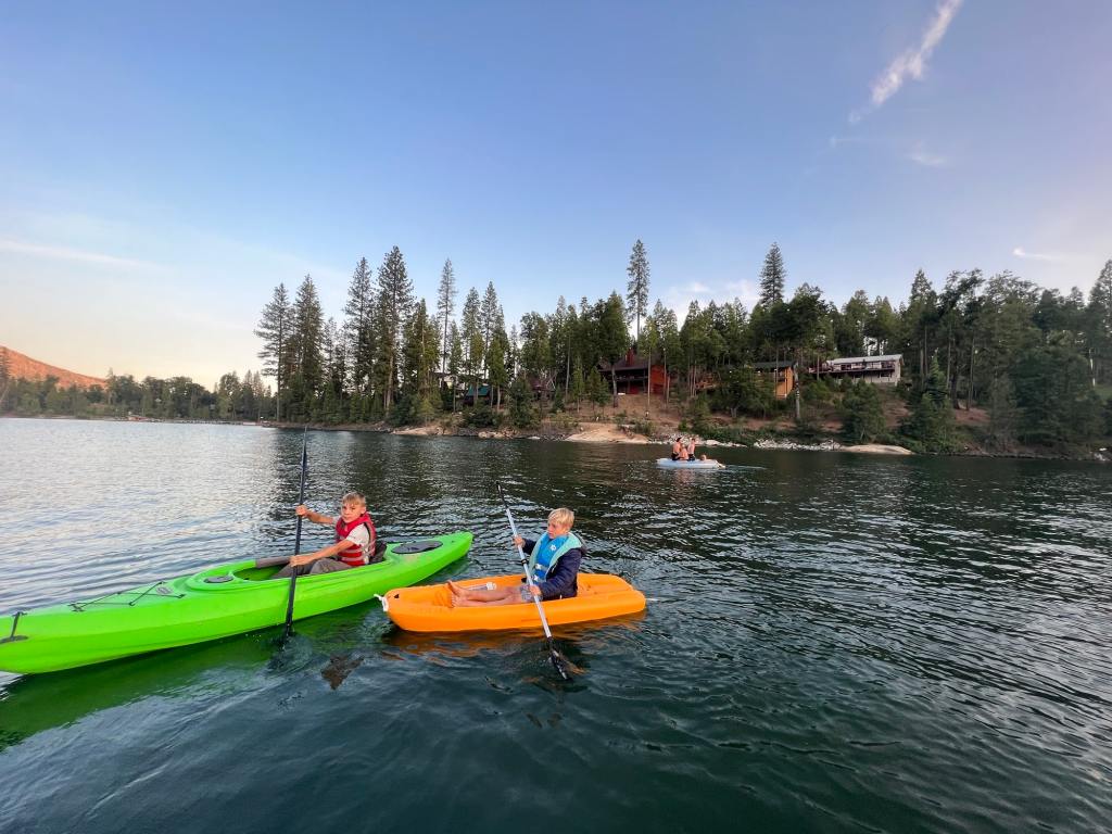 Kayaking on Bass Lake while camping at one of the campgrounds there