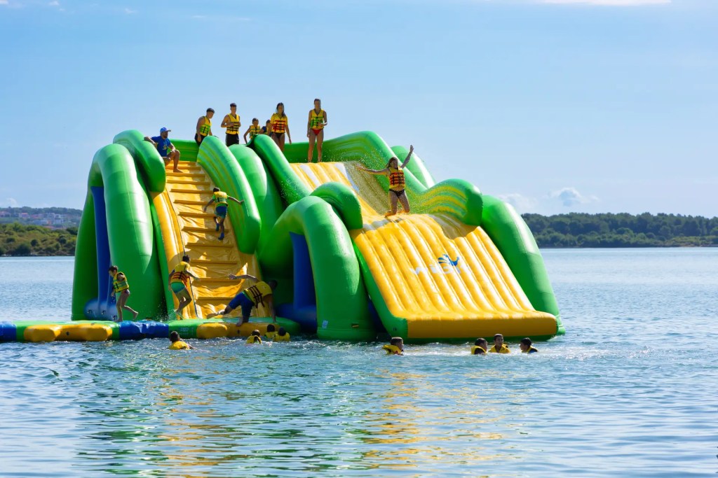 A large inflatable waterslide on a lake in Michigan