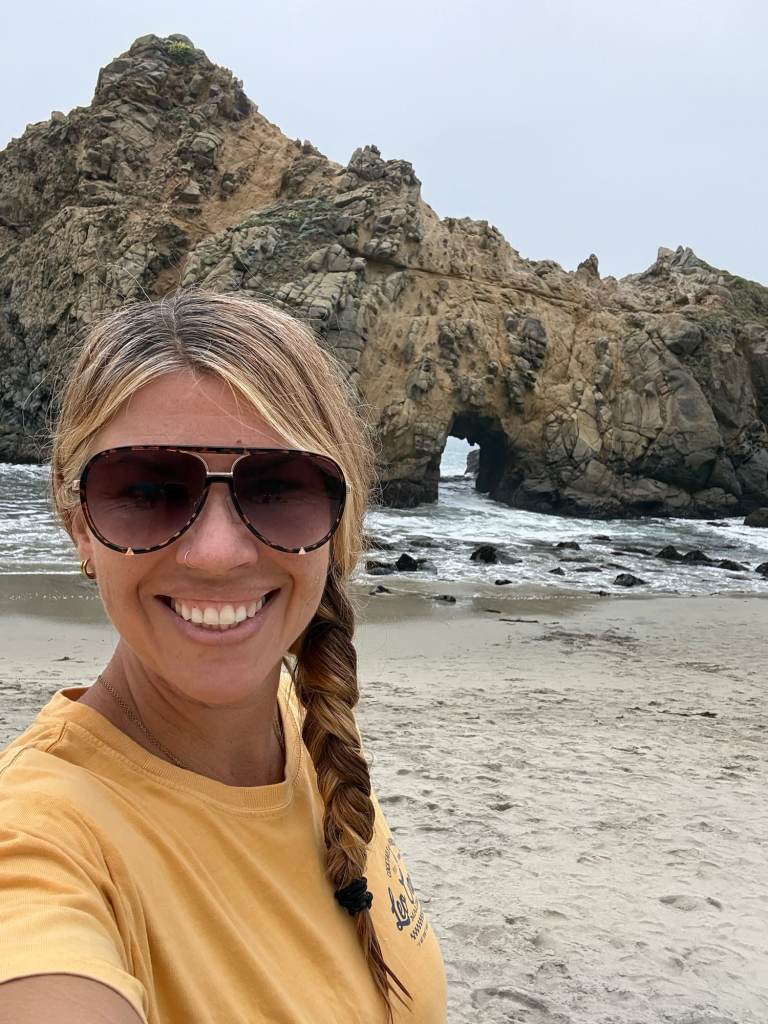 A scenic view of a rocky coastal landscape at Pfeiffer Beach, which is one of the best ca beaches.