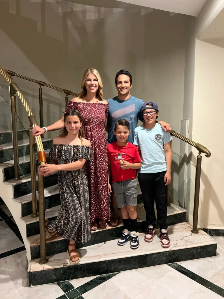 A large family of 5 on vacation at an all-inclusive resort