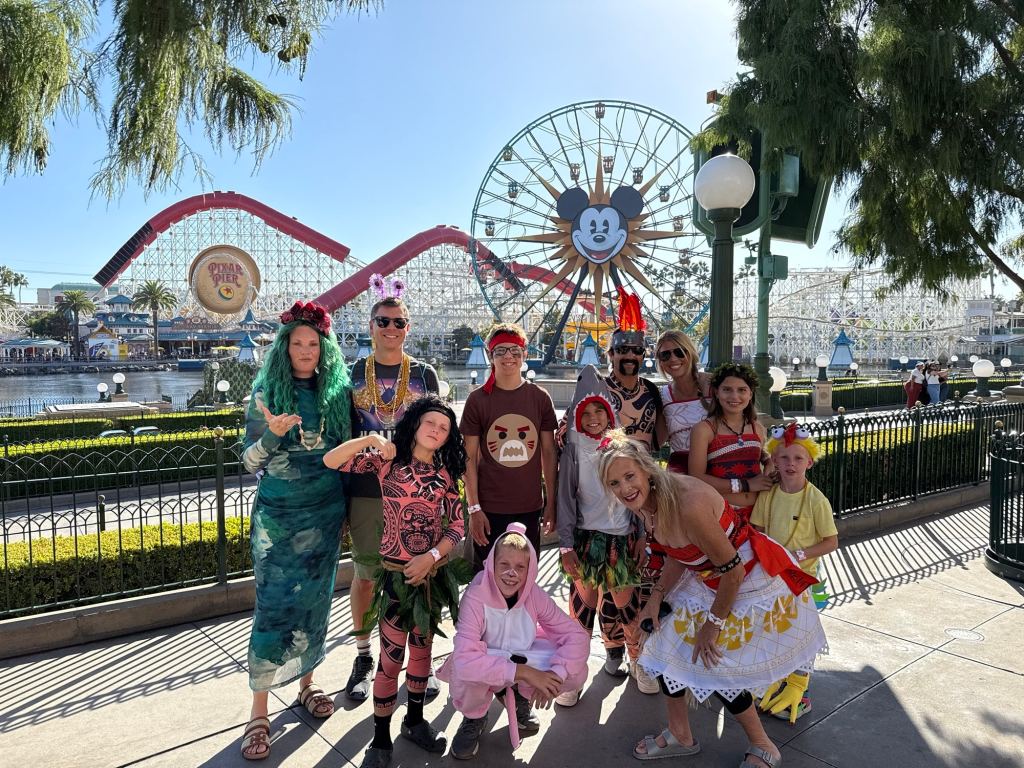 A group of people in costumes at the Oogie Boogie Bash at Disneyland