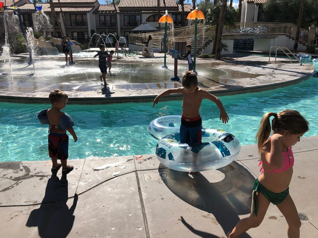 Three kids, an innertube and a lazy river at the Omni Rancho Las Palmas Palm Springs