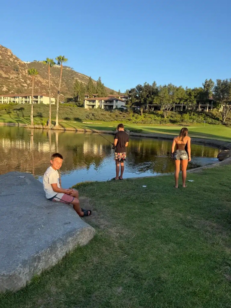 Kids fishing in the fishing pond at the Welk Resort in Escondido